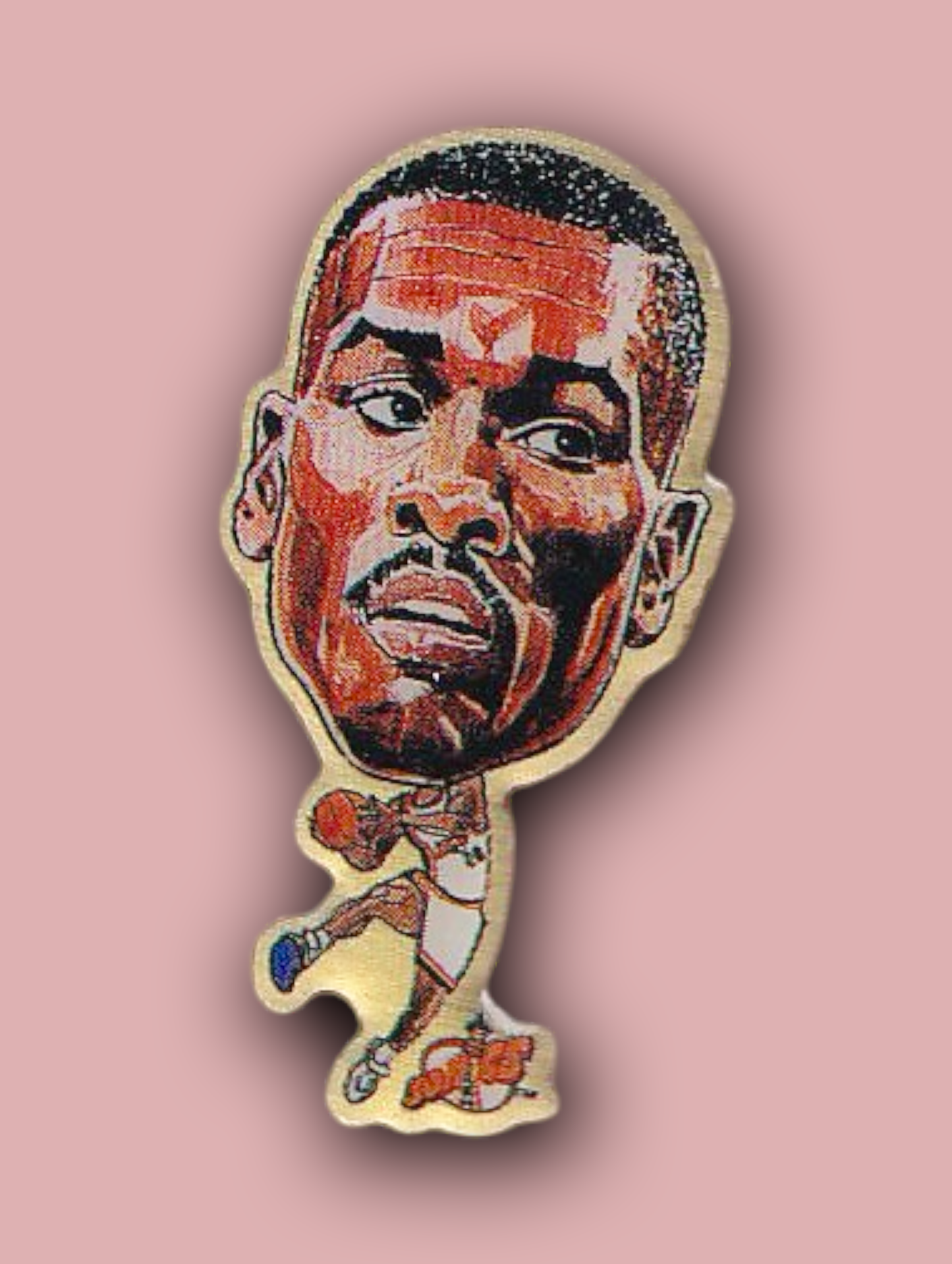 An enamel pin featuring a portrait of Gary Payton