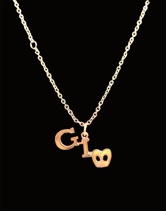 This image features a stylish "Good in Bed" necklace, perfect for adding a playful yet chic touch to any outfit. The necklace showcases a small, golden charm with the letters "G" and "I" intertwined, symbolizing the phrase "Good in Bed.