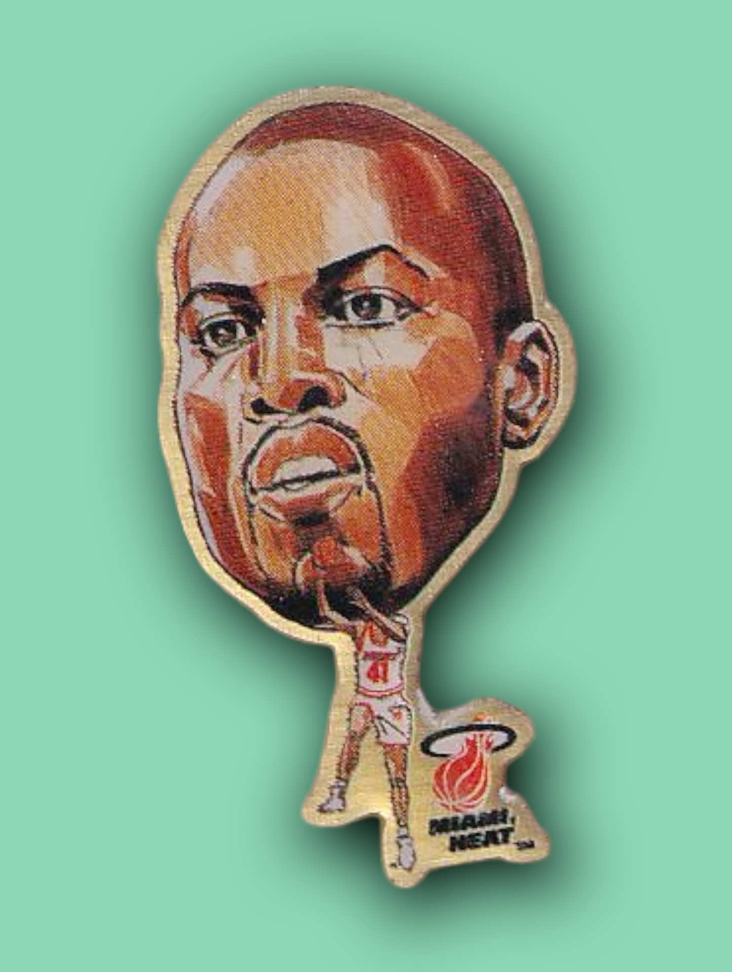 An enamel pin featuring a portrait of Glen Rice