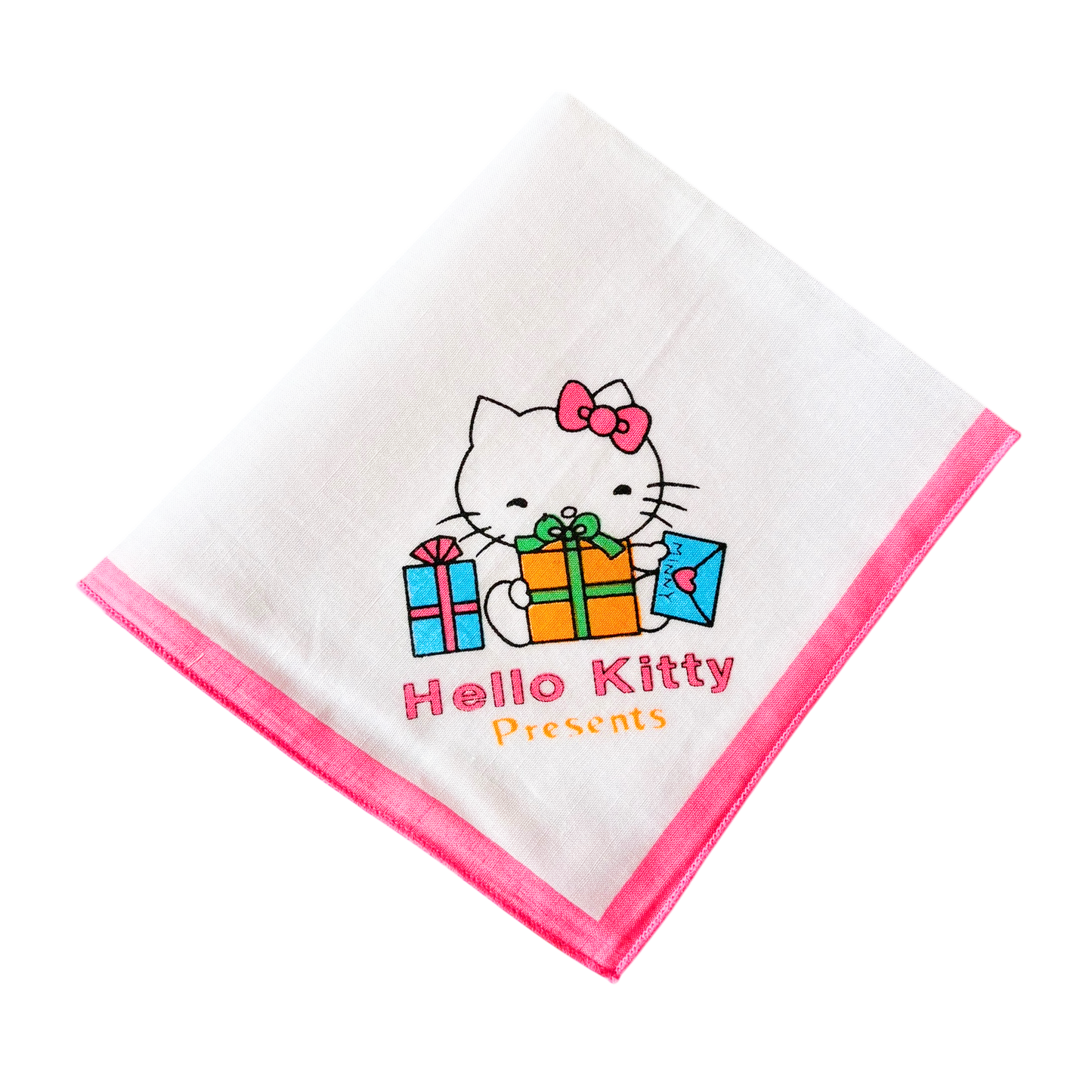 A white handkerchief with a pink border featuring an illustration of Hello Kitty holding a present.
