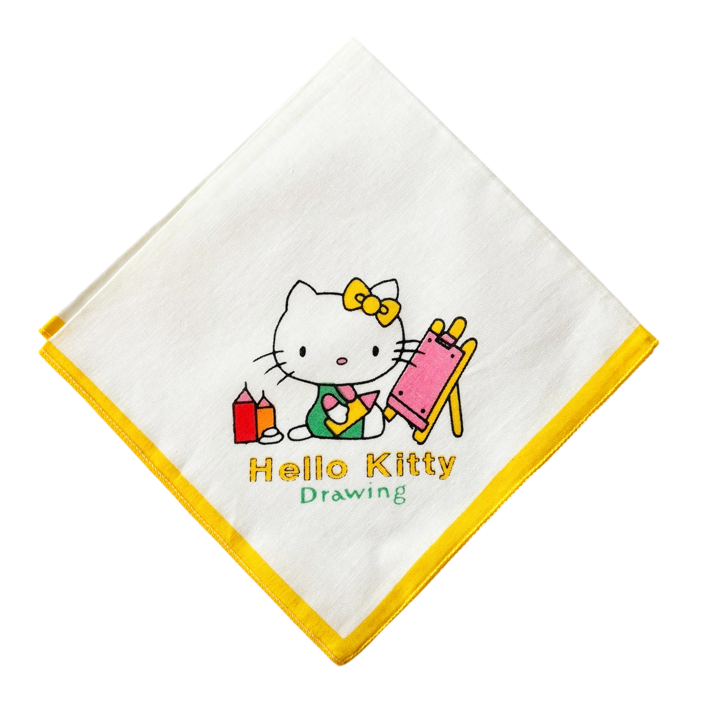 A white handkerchief with a yellow border featuring an illustration of Hello Kitty painting.