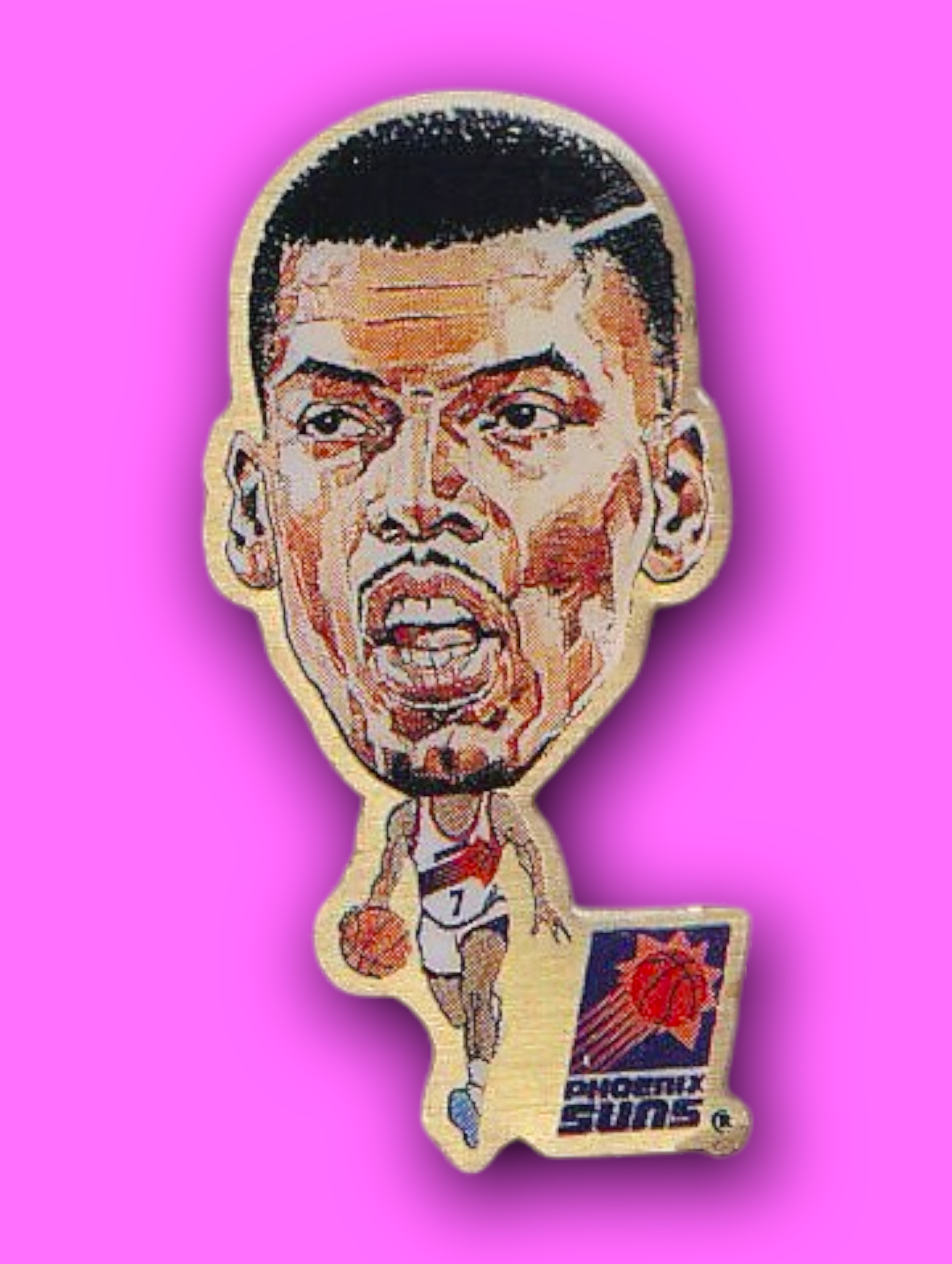 An enamel pin featuring a portrait of Kevin Johnson