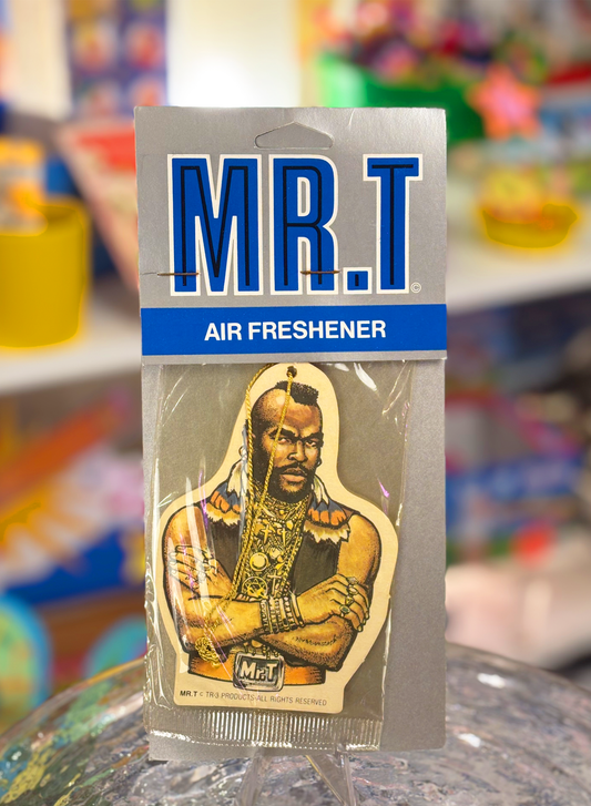 Mr. T air freshener in original packaging, featuring an illustration of the character on a blue and white background.
