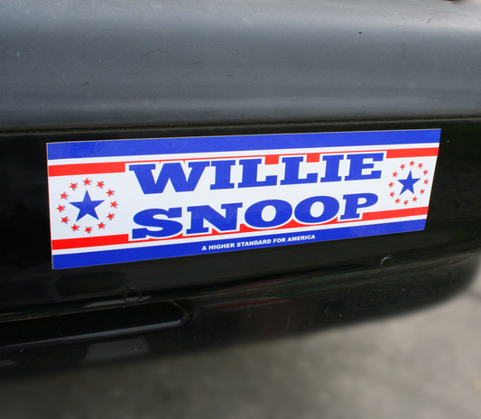 A bumper sticker with a blue and red design featuring the text 'WILLIE SNOOP' on a vehicle.
