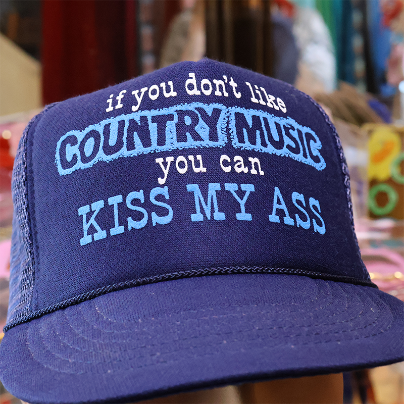 Blue cap with blue text on a blurred background
