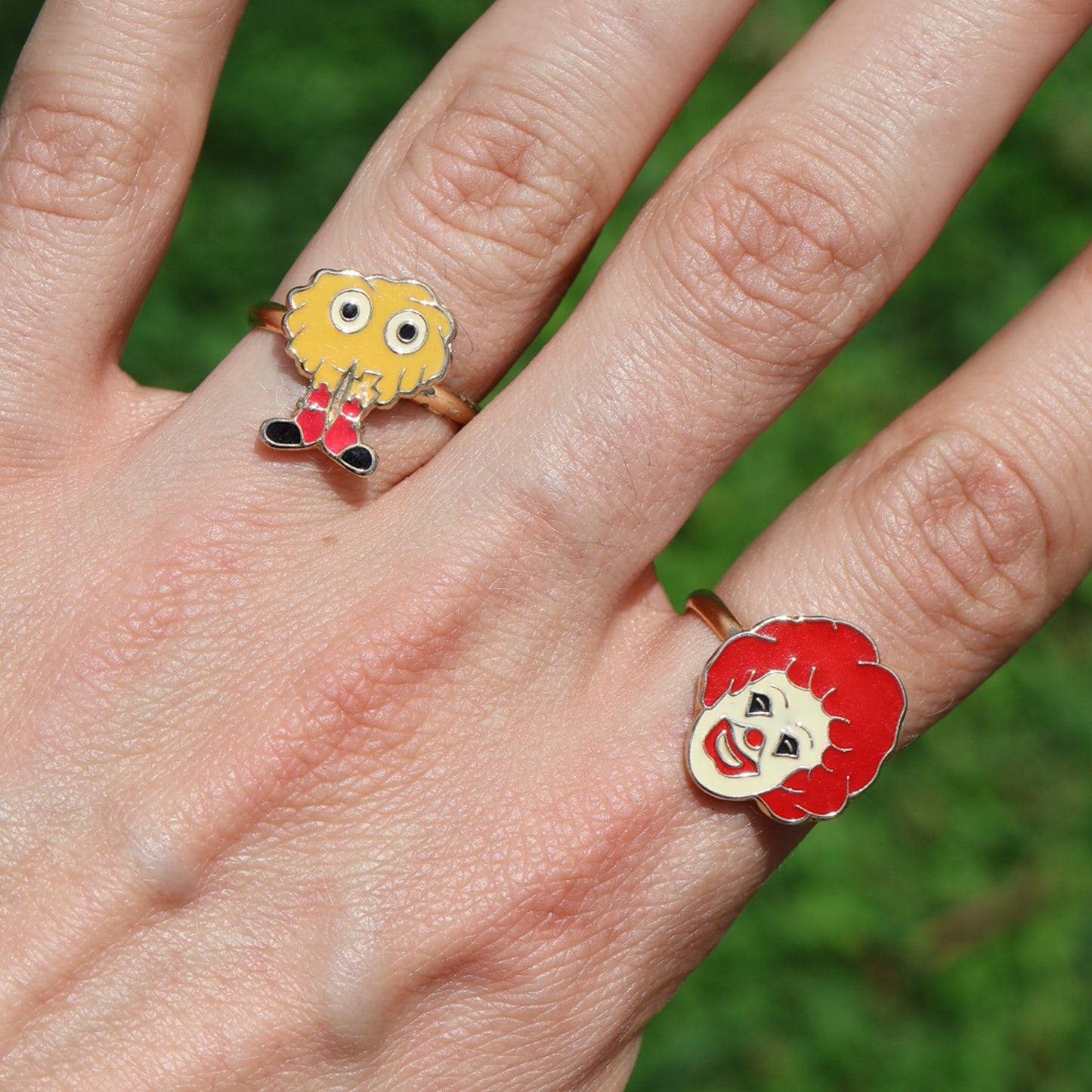 Two rings, one with Fryguy and one with Ronald McDonald