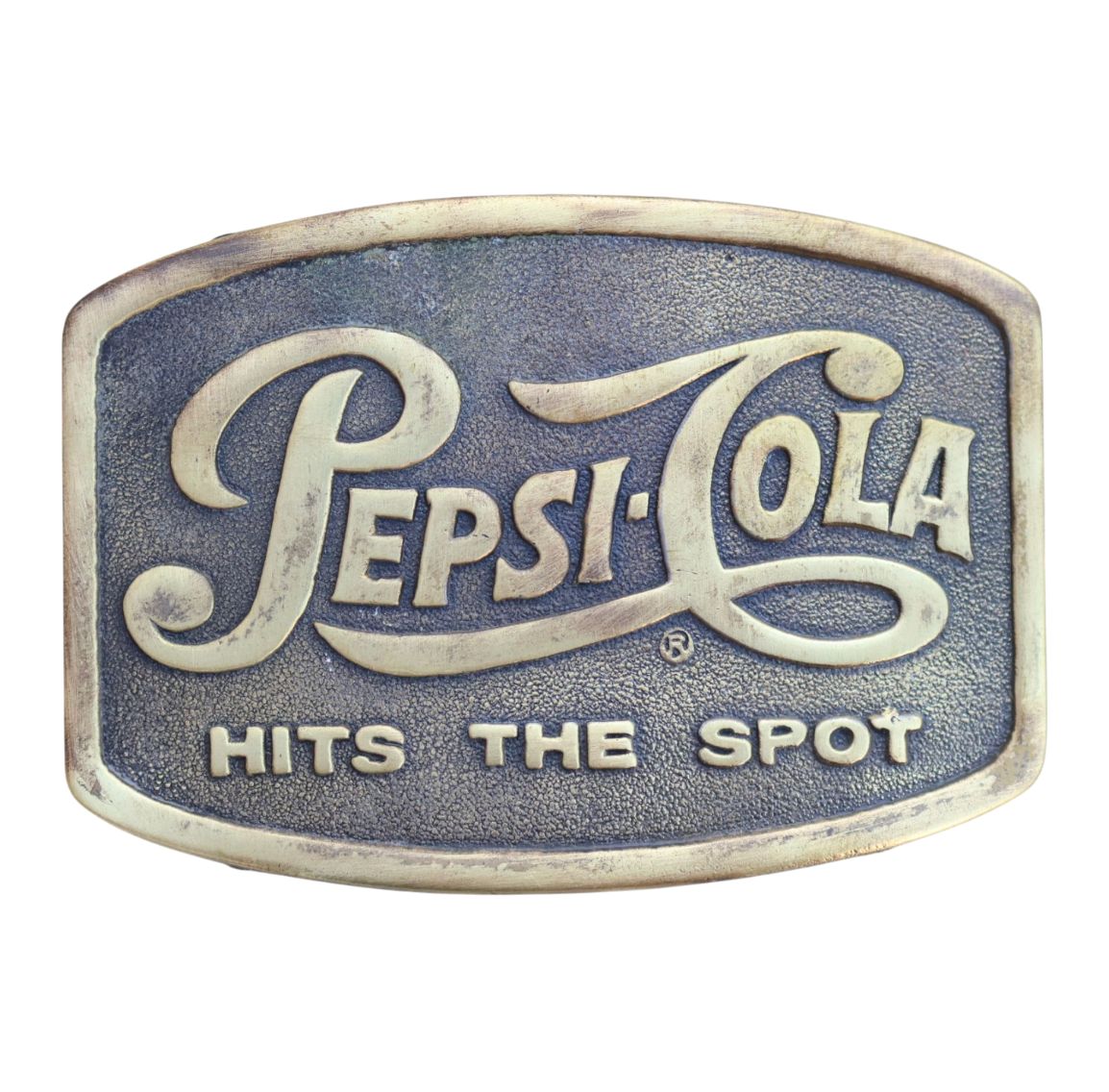 belt buckle reading pepsi cola hits the spot