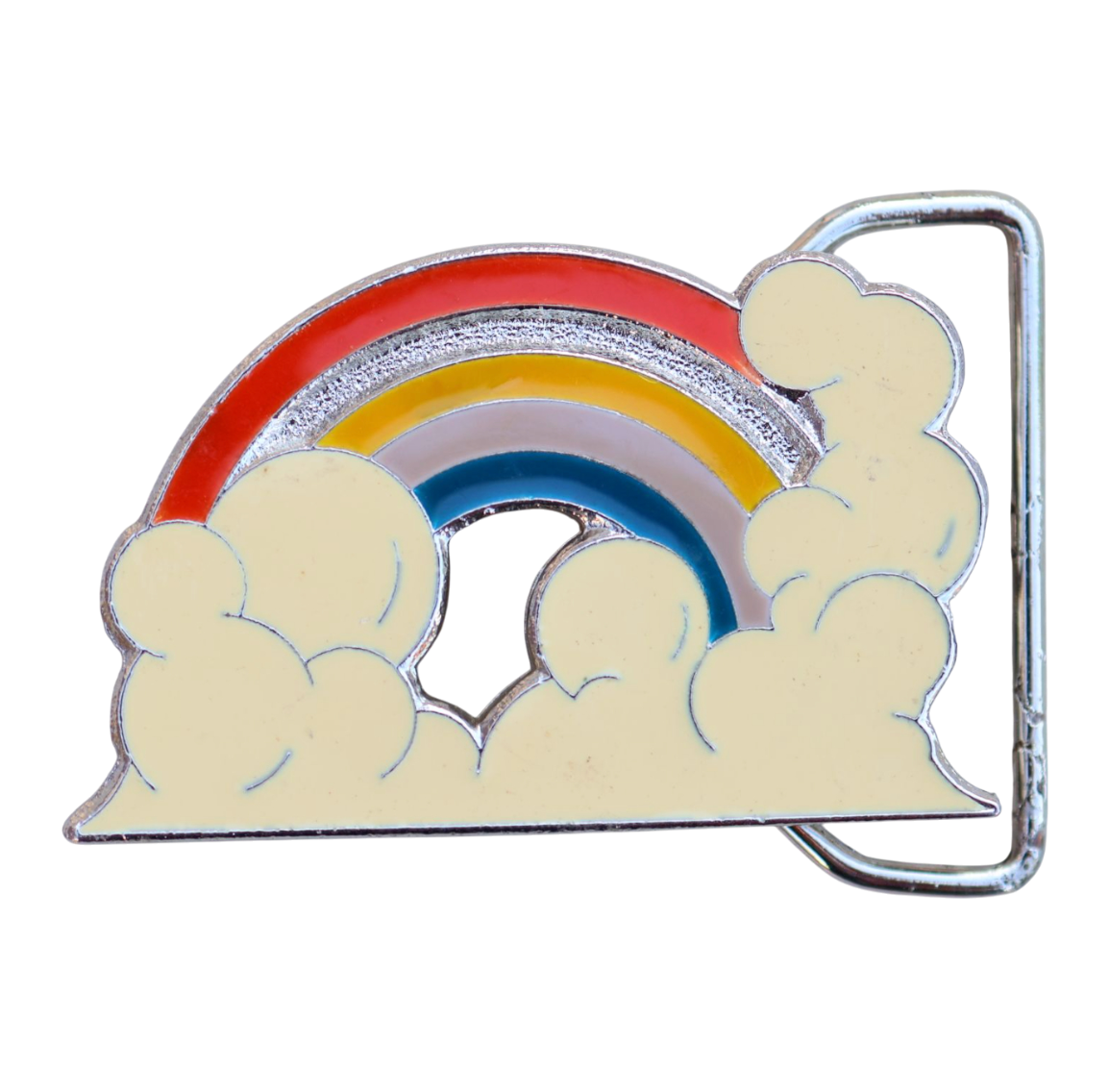 Belt buckle with rainbow and cloud design
