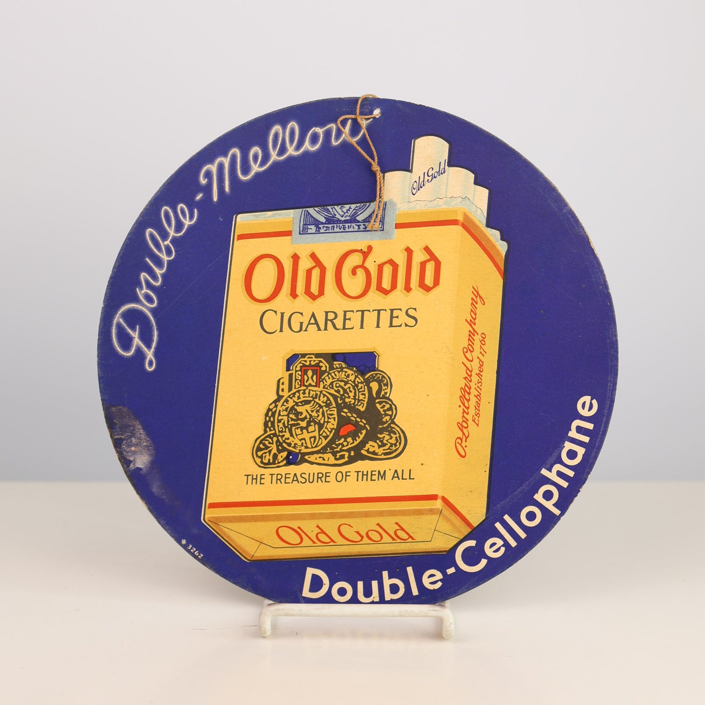 vintage 1930s promotional item for Old Gold Cigarettes with a blue border and yellow packaging.
