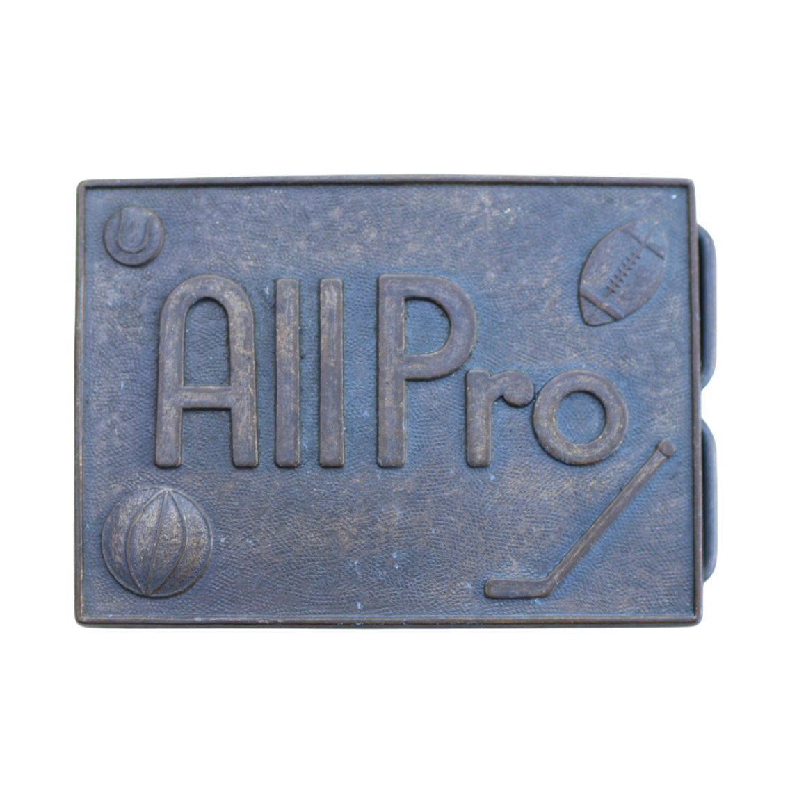 vintage brass belt buckle reading "all pro" with hockey, basket, baseball, and football symbols