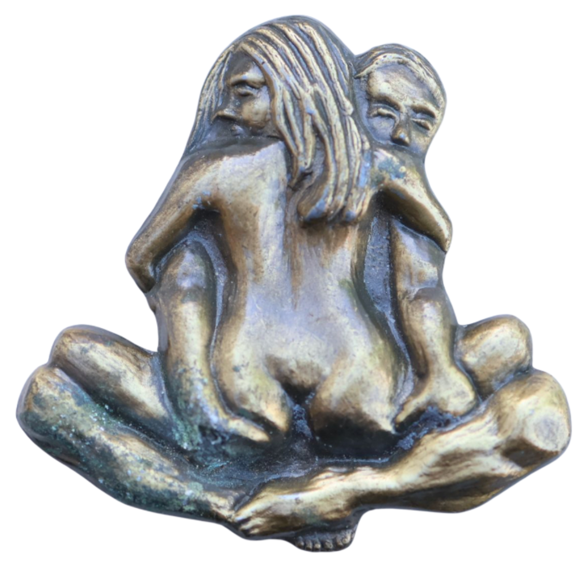 vintage belt buckle with a nude couple in a suggestive position