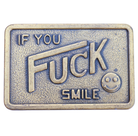 vintage belt buckle with 'if you fuck smile'