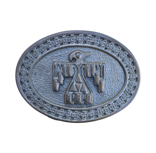 vintage belt buckle featuring a native american thunderbird symbol