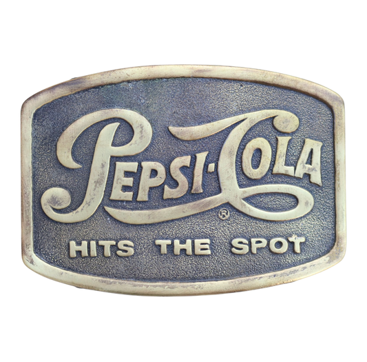 belt buckle reading pepsi cola hits the spot