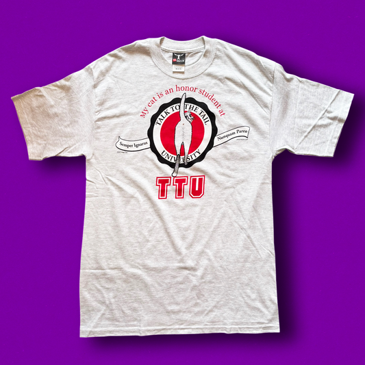 White crew neck t-shirt with a graphic print of a cat and the text 'TTU' on the front. Vintage Hep Cat Tee
