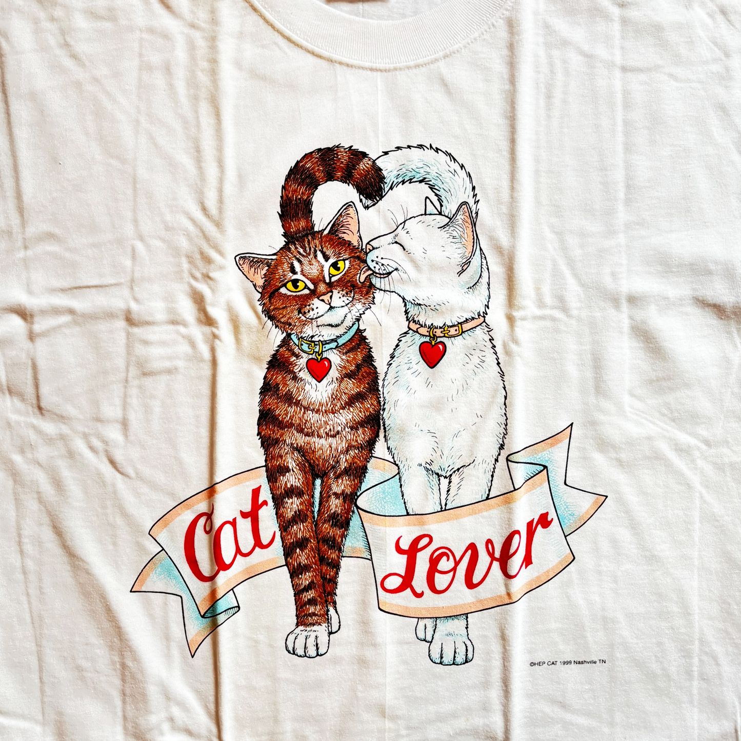 T-shirt with illustration of two cats and 'Cat Lover' text.