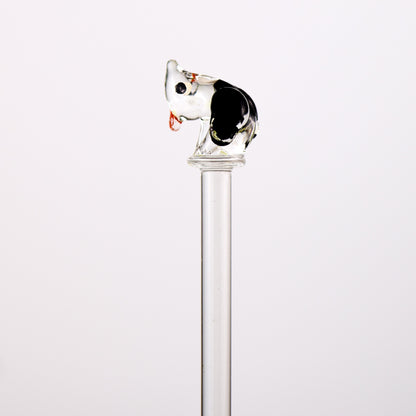 glass swizzle stick with animal top on a white background