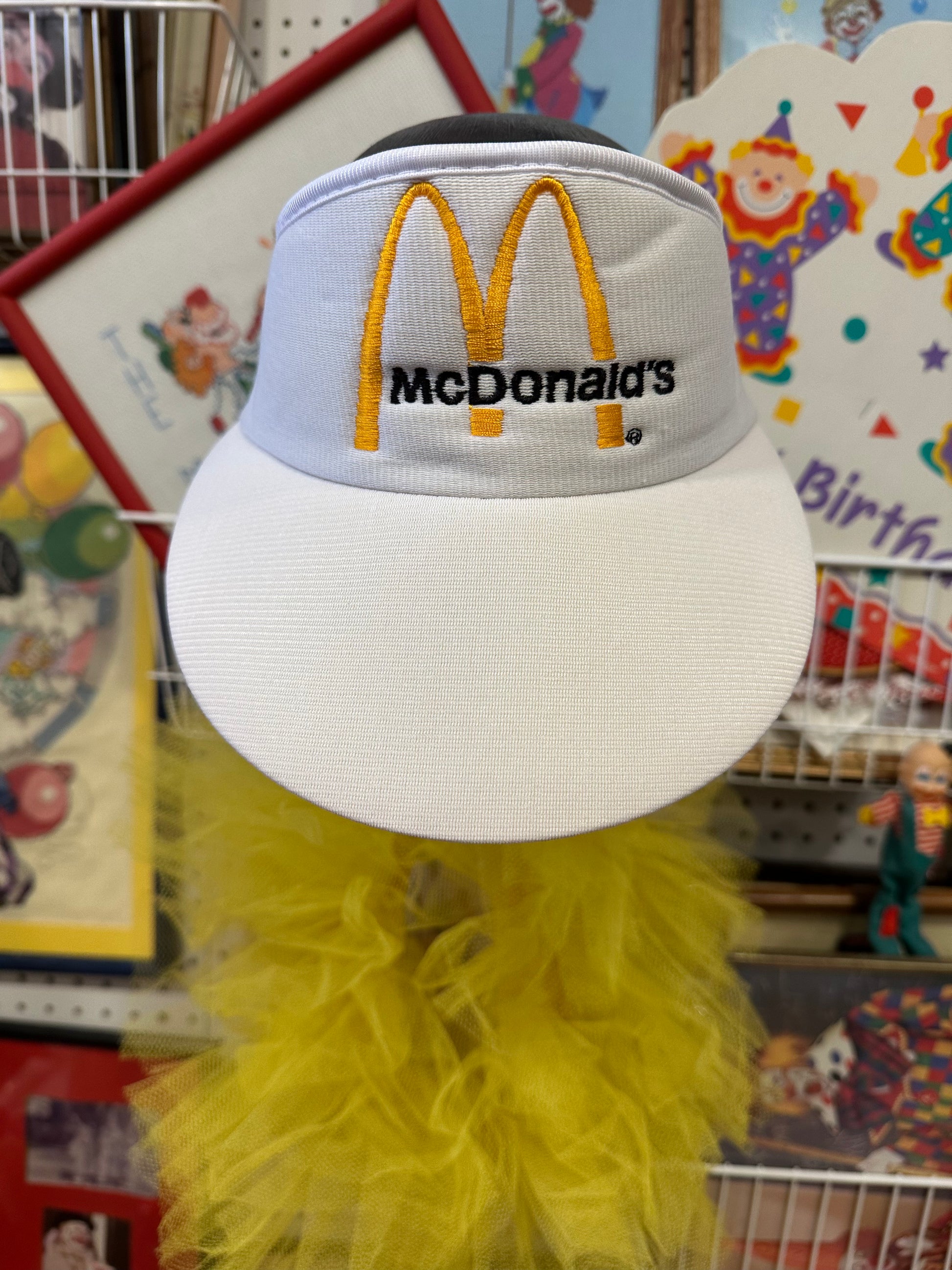 Vintage white visor with McDonald's logo embroidered. Employee issued Deadstock New Old Stock wearable advertising